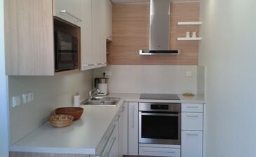 Kuchyň panelák lamino - kombinace bílá aimitace dřeva 2 | Realizace - Kuchyně - rohová Brno